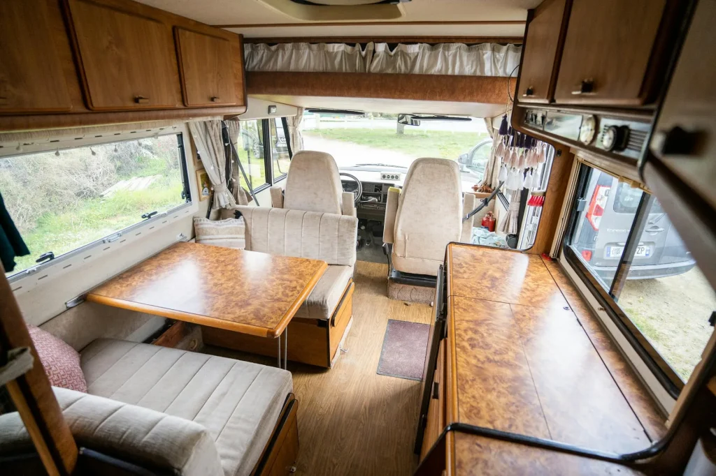 Caravan interior with window showing condensation on a cool day