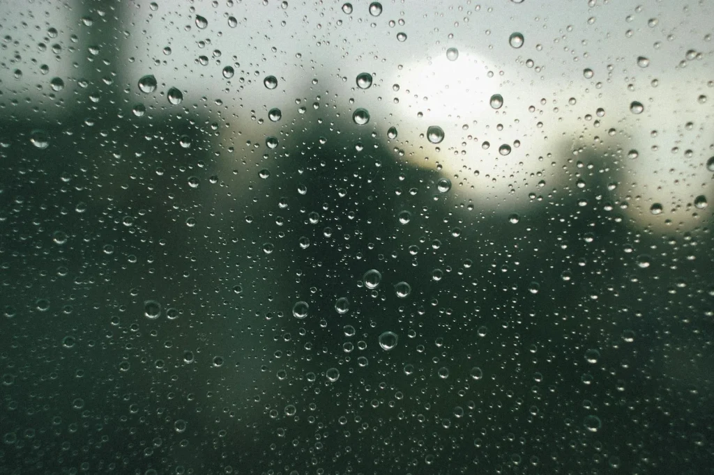 Condensation water droplets on a window in the morning