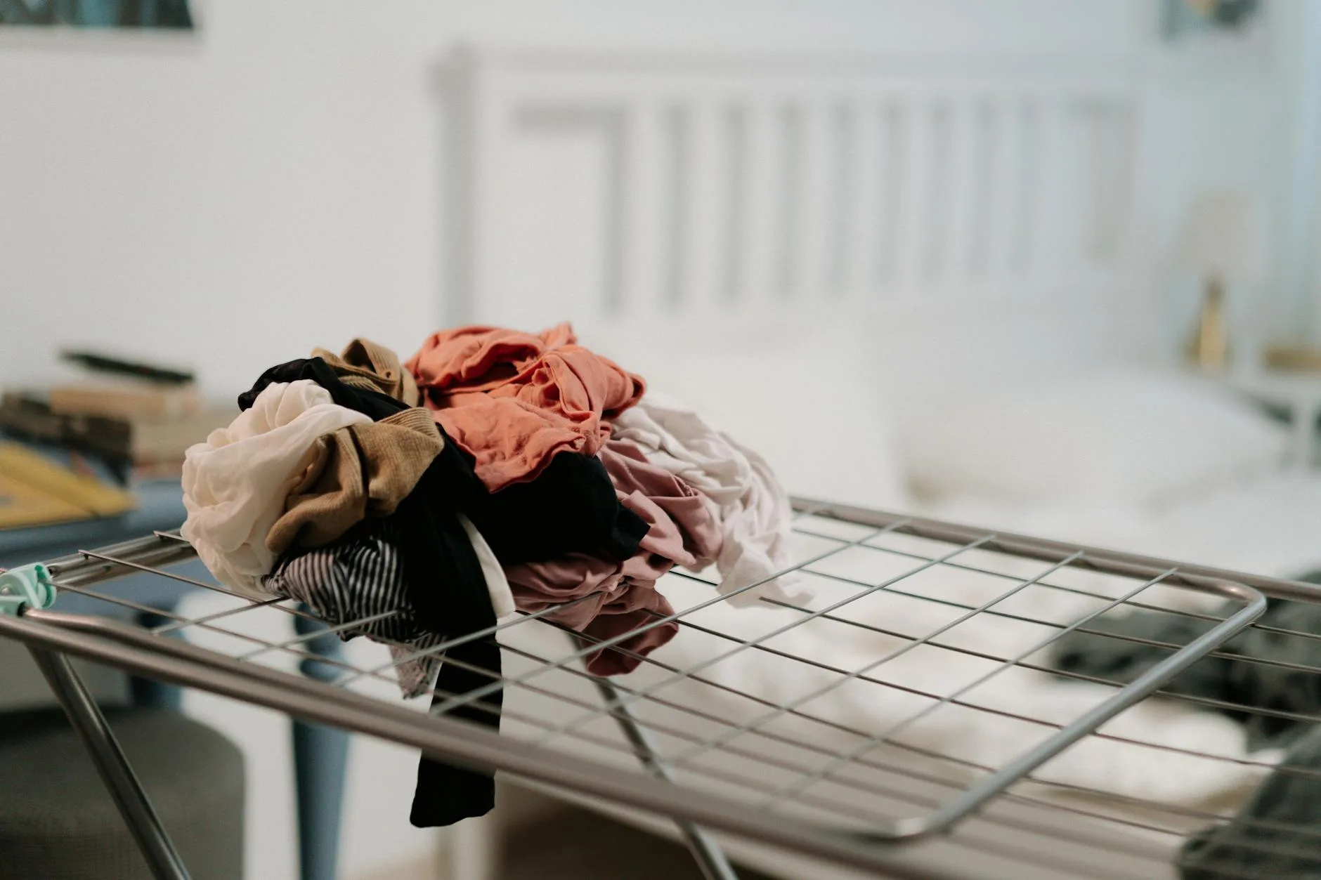 Clothes drying on an indoor airer in a living room
