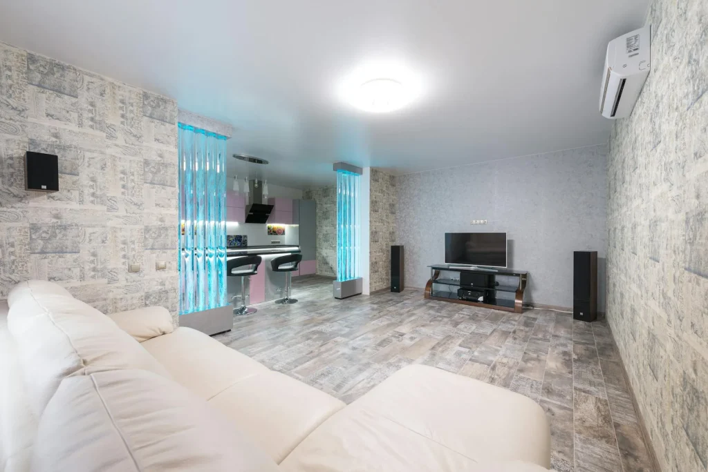 Modern air purifier in a bright white living room