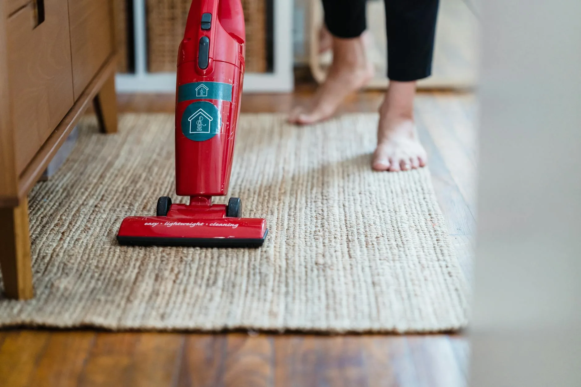 Vacuum cleaner removing pet hair from carpet