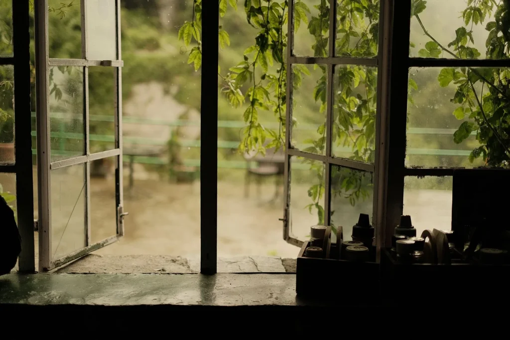 Open window bringing fresh air into a bright home interior